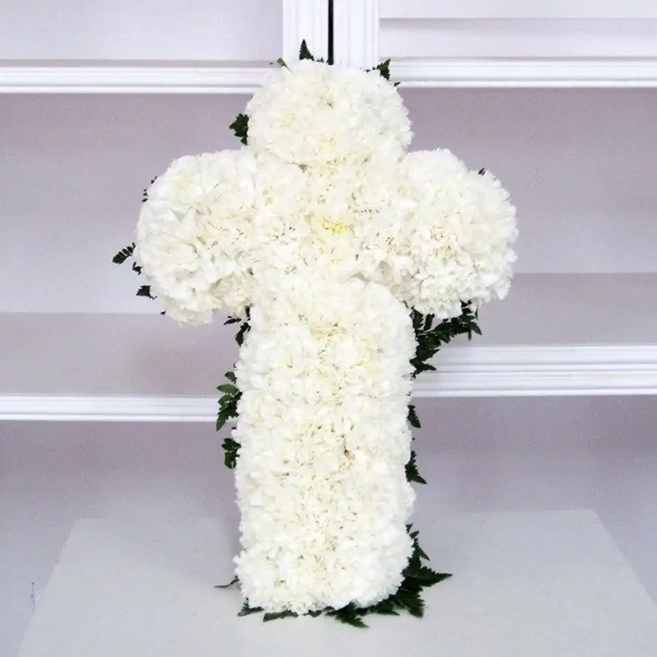 Creu de clavells blancs